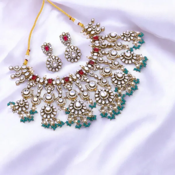 Grand_Gold-Plated_Bridal_Necklace_Set_with_Kundan,_Ruby,_Emerald_Accents,_and_Pearl_Drops_For_Women_&_Girls