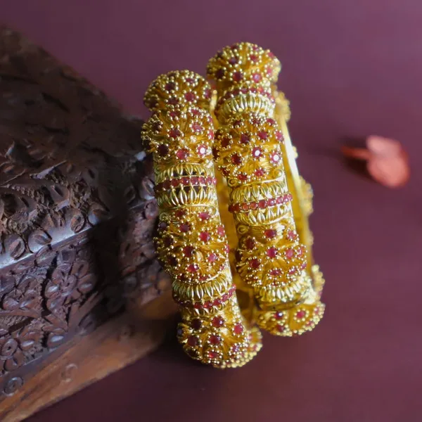 Trendisia_Antique_Gold-Plated_Bangles_with_Intricate_Beaded_Detailing_&_Ruby_Accents_For_Women_&_Girls