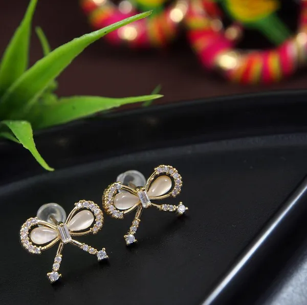 Korean_Gold_Plated_Sparkly_Bow_Stud_Earring-_KRNER_2965_For_Women_&_Girls