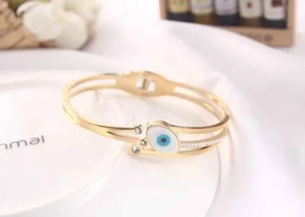 Stainless_Steel_Gold_Plated_Evil_Eye_Kada-_STKD_4922_For_Women_&_Girls