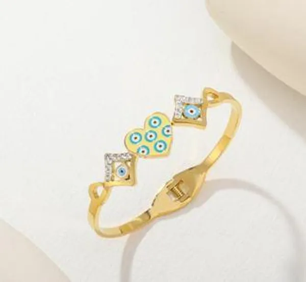Stainless_Steel_Gold/Rosegold_Plated_Heart_Shaped_Evil_Eye_K_For_Women_&_Girls