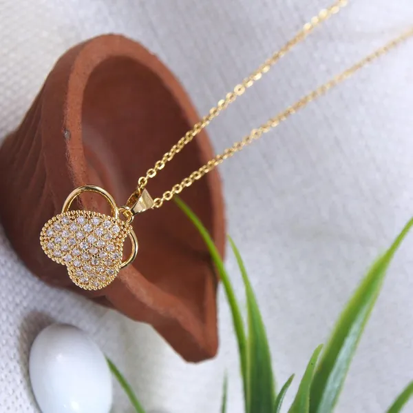 Stainless_Steel_Gold_Plated_Heart_Shaped_Spinning_Pendent_Ne_For_Women_&_Girls