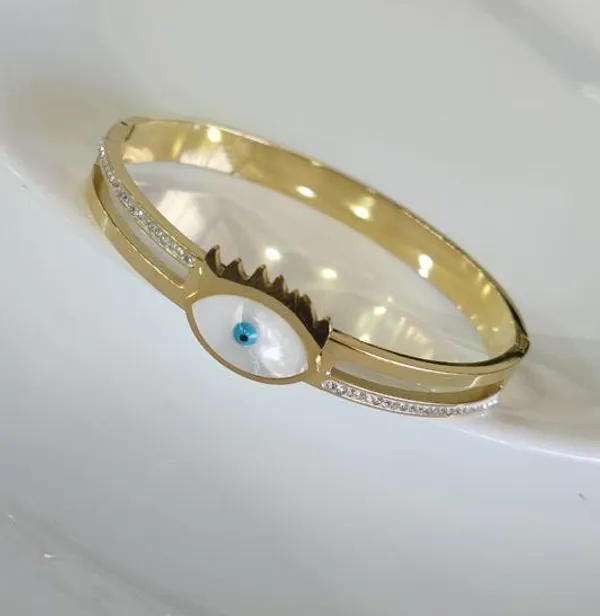 Stainless_Steel_Gold_Plated_Lashes_Evil_Eye_Kada-_STKD_4844_For_Women_&_Girls