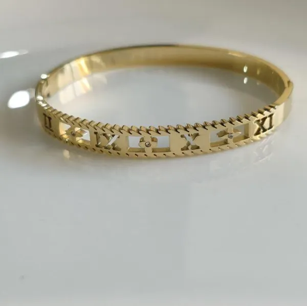 Stainless_Steel_Gold_Plated_Roman_Number_Kada_-_STKD_4945_For_Women_&_Girls