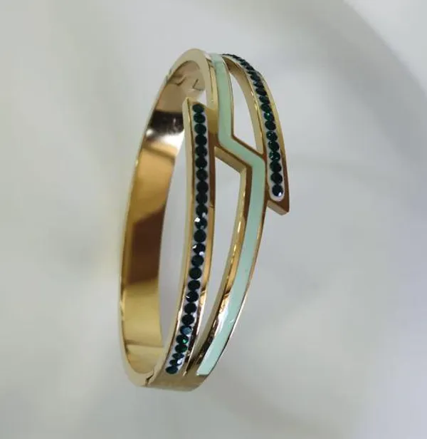 Stainless_Steel_Gold_Plated_Thunder_Shaped_Kada_-_STKD_4851_For_Women_&_Girls