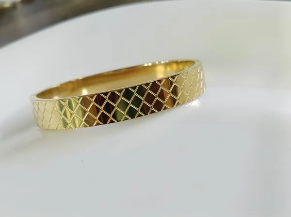 Stainless_Steel_Gold_Plated_Wide_Criss_Cross_Kada-_STKD_4836_For_Women_&_Girls