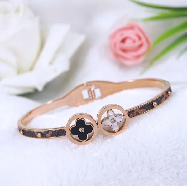 Stainless_Steel_Gold/Rosegold_Plated_Clover_Design_Kada-_STK_For_Women_&_Girls