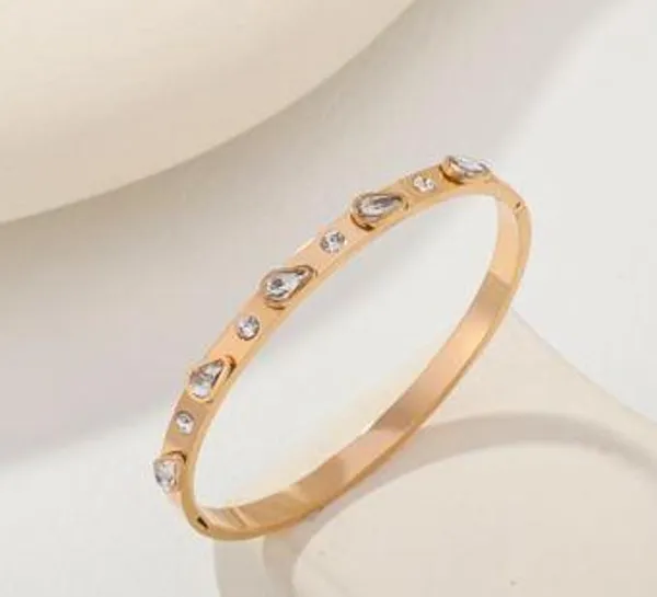 Stainless_Steel_Gold/Rosegold_Plated_Tear_Drop_Kada-_STKD_4900_For_Women_&_Girls