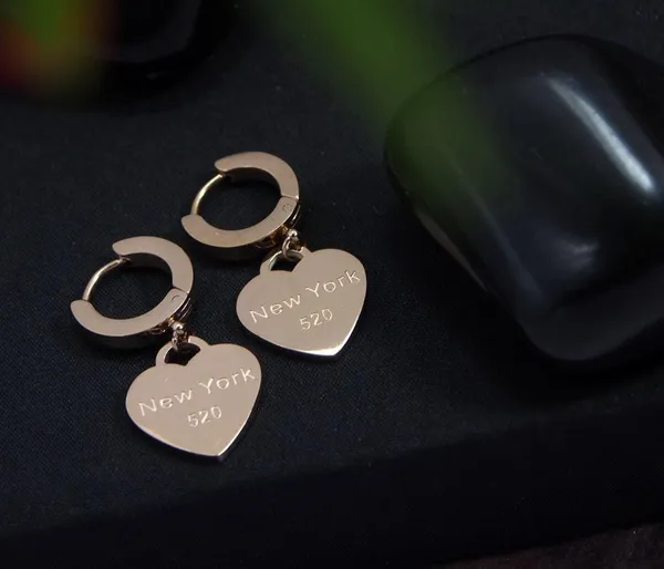 Stainless_Steel_Rosegold_Plated_Heart_Shaped_Hoops_Earring-_STNER_2756_For_Women_&_Girls
