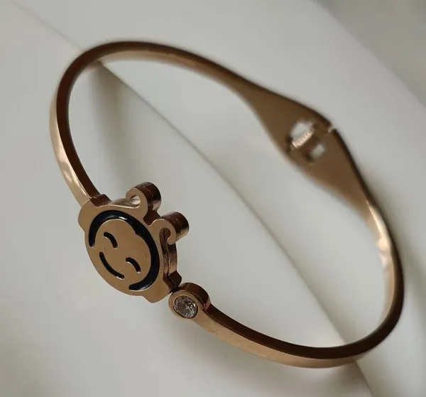 Stainless_Steel_Rosegold_Plated_Smiley_Face_Fancy_Kada-_STKD_For_Women_&_Girls