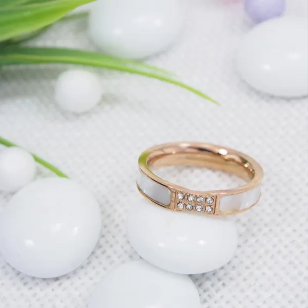 Stainless_Steel_Rosegold_Plated_White_Shell_Finger_Ring-_FR_For_Women_&_Girls