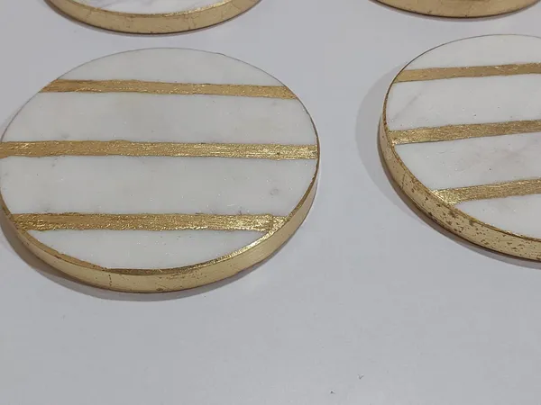 mat_gold_round_marble_coasters_(Set_of_4)
