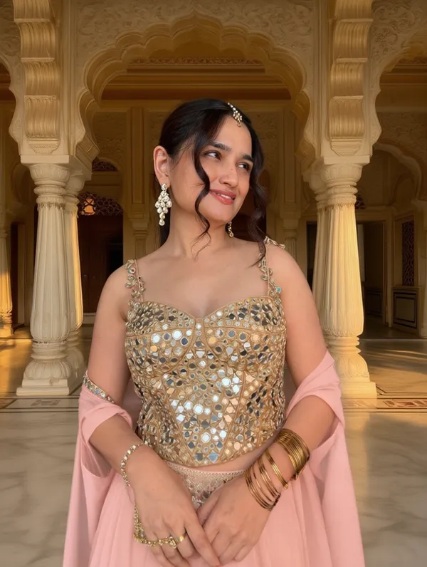3_PIECE_HAND_EMBROIDERED_MIRROR_WORK_CORSET_BLOUSE_WITH_BABY_PINK_LEHENGA_AND_CAPE