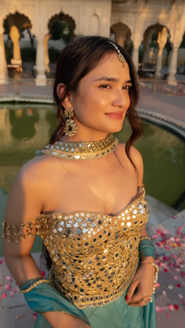 Elegant_Mirror-Work_Corset_blouse_with_tissue_Lehenga_Set