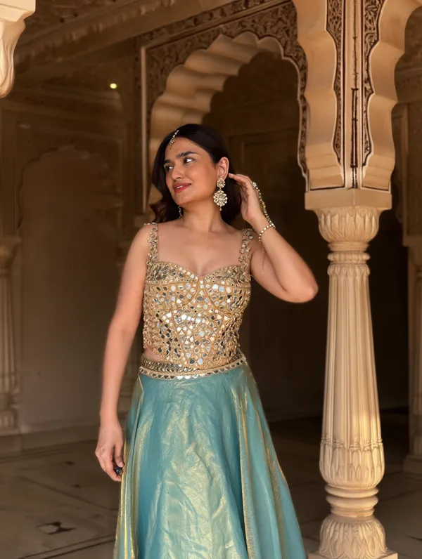 Elegant_Mirror-Work_Corset_blouse_with_tissue_Lehenga_Set