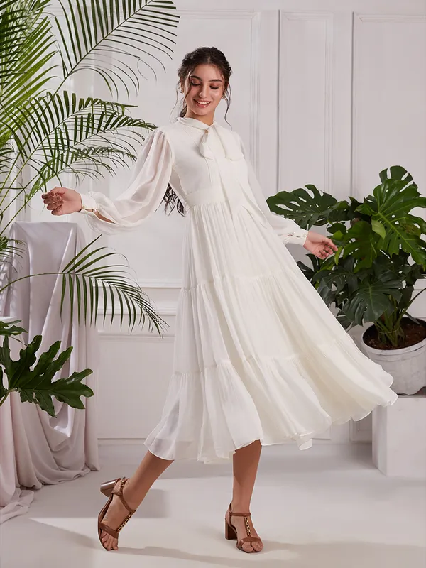 Elegant_White_Pleated_Midi_Dress_|_Tiered_dress_with_Bow_tie_Detail