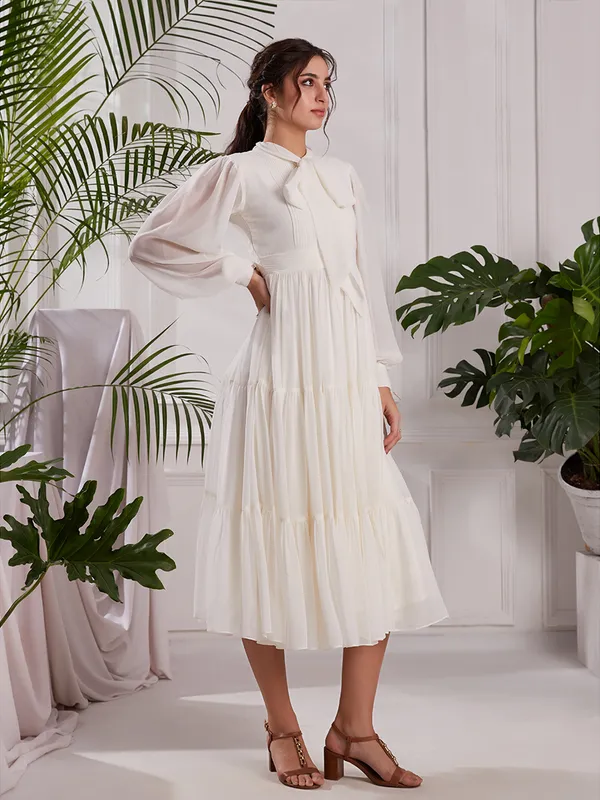 Elegant_White_Pleated_Midi_Dress_|_Tiered_dress_with_Bow_tie_Detail