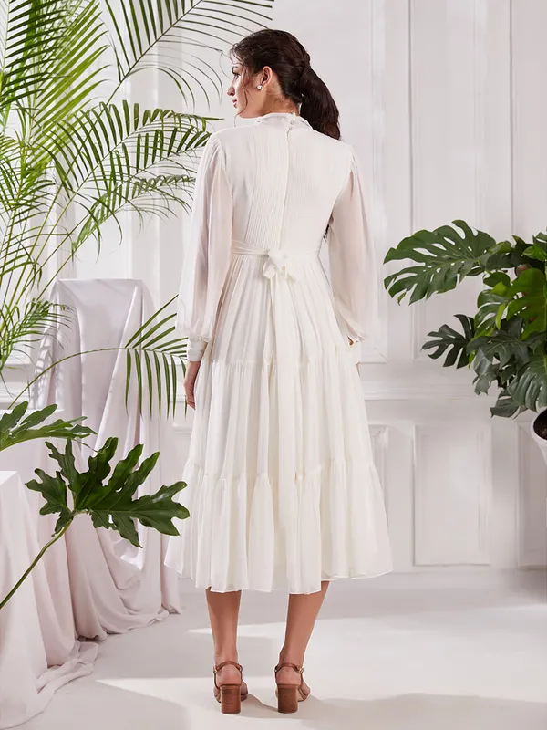 Elegant_White_Pleated_Midi_Dress_|_Tiered_dress_with_Bow_tie_Detail