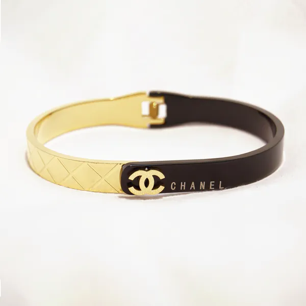 Half_n_Half_gold_black_cross_band_style_bracelet