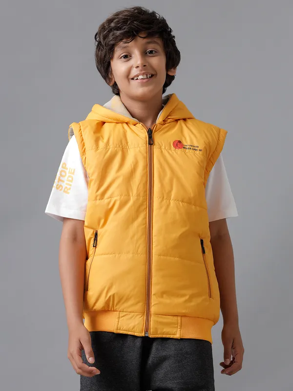 Boys_Sleeveless_Reversable_Taffeta_Jacket_With_All_Over_Print_On_Reverse_Side