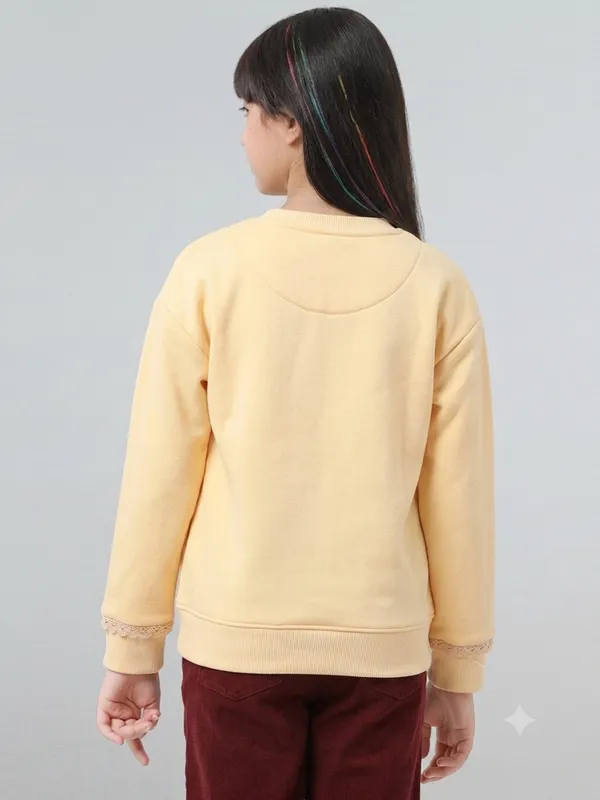 Under_Fourteen_Only_Girls_Yellow_Solid_Color_Block_Sweatshirt_|_Full_Sleeves_Relaxed_Fit_Crew_Neck_Fleece_Sweatshirt_with_Chest_Graphic_Print_for_Kids