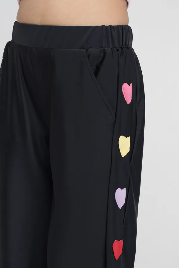 Under_Fourteen_Only_Girls_Black_Solid_Wide_Leg_Pants_|_Elastic_Waist_Polyester_Trousers_with_Heart_Print_Side_Panels_&_Side_Pockets_for_Kids