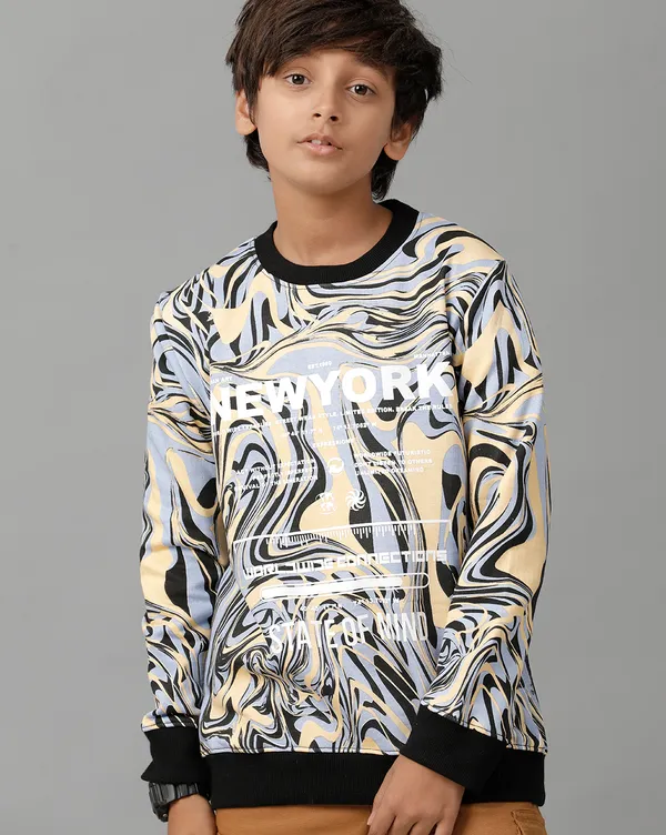 Girls_Long_Sleeve_Printed_Top_With_Ruffles_At_The_Chest