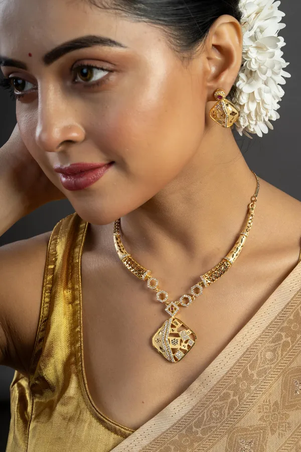 KAYRAH_Women_Golden_Brass_Material_Crafted_Zircon_Stone_Studed_Necklace_with_Earrings_|_Modern,_Esthetic_Jewellery_for_Women_and_Girls|_Gifting_Accessories