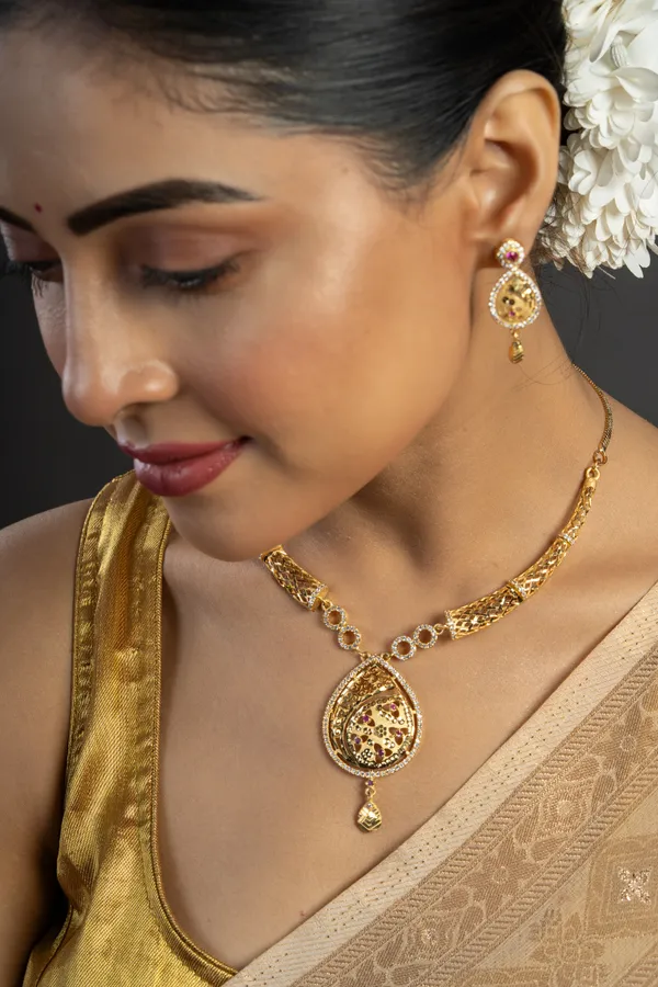 KAYRAH_Women_Golden_Brass_Material_Crafted_Zircon_Stone_Studed_Necklace_with_Earrings_|_Modern,_Esthetic_Jewellery_for_Women_and_Girls|_Gifting_Accessories