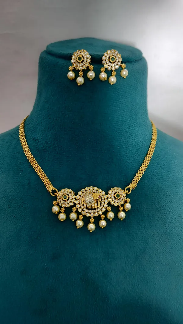 KAYRAH_Gold_Plated_Elephant_Design_Necklace_Set_with_Pearl_Drop_Earrings,_American_Diamond,_Brass,_Ethnic_Style,_for_Wedding_&_Festive