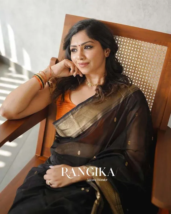 Black_Color_Premium_Cotton_Silk_Saree_With_Classy_Blouse_and_tassels