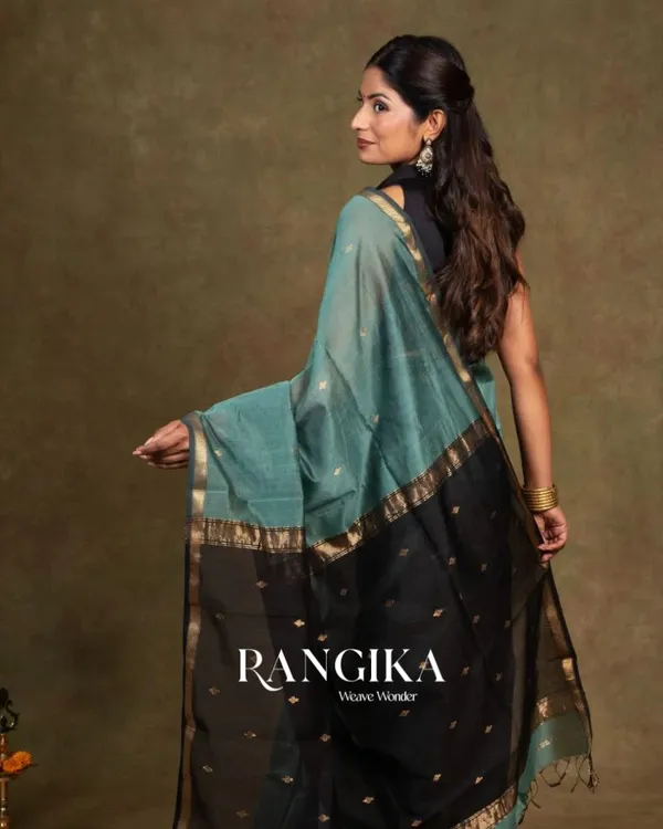 Bottle_Blue_And_Black_Premium_Cotton_Silk_Saree_With_Classy_Blouse_and_tassels