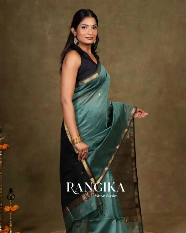 Bottle_Blue_And_Black_Premium_Cotton_Silk_Saree_With_Classy_Blouse_and_tassels