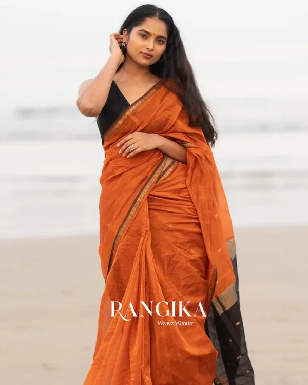 Orange_Premium_Cotton_Silk_Saree_With_Classy_Blouse_and_tassels