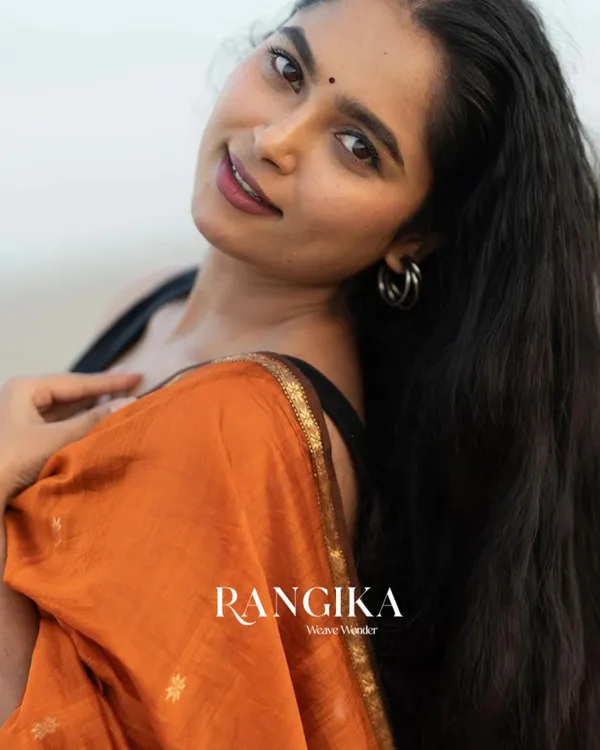 Orange_Premium_Cotton_Silk_Saree_With_Classy_Blouse_and_tassels