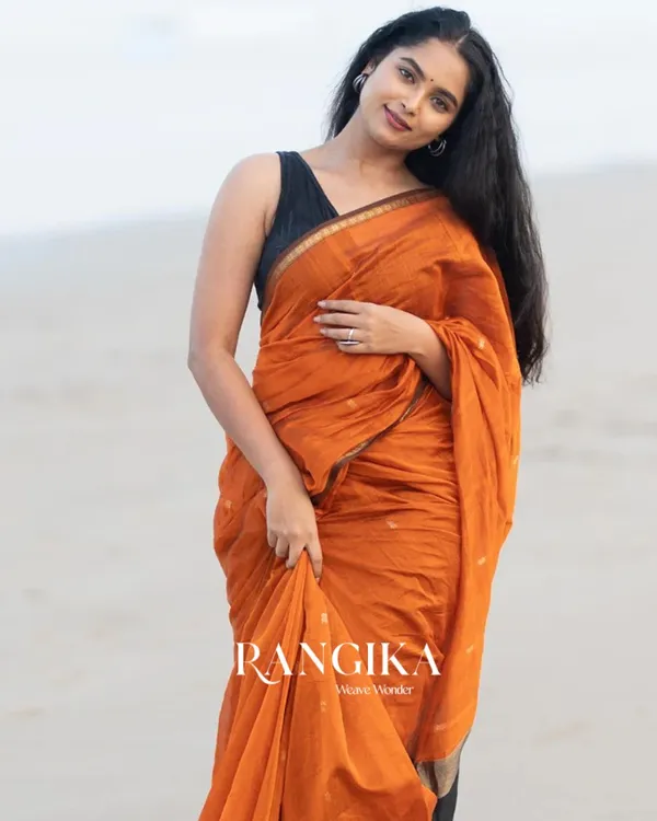 Orange_Premium_Cotton_Silk_Saree_With_Classy_Blouse_and_tassels