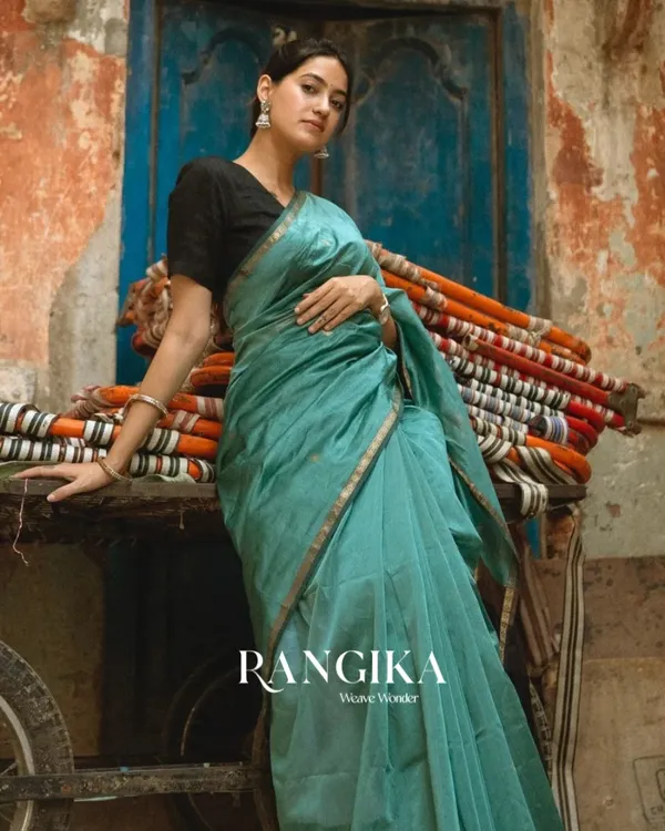 Bottle_Green_And_Black_Premium_Cotton_Silk_Saree_With_Classy_Blouse_and_tassels