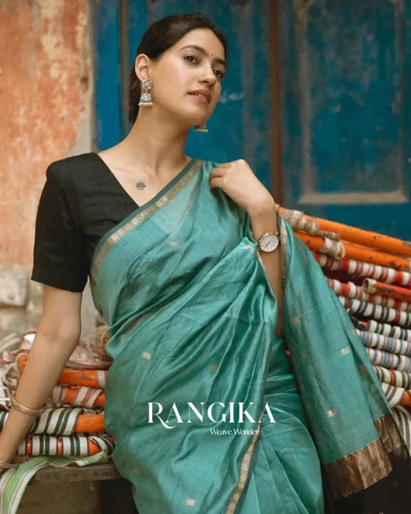 Bottle_Green_And_Black_Premium_Cotton_Silk_Saree_With_Classy_Blouse_and_tassels