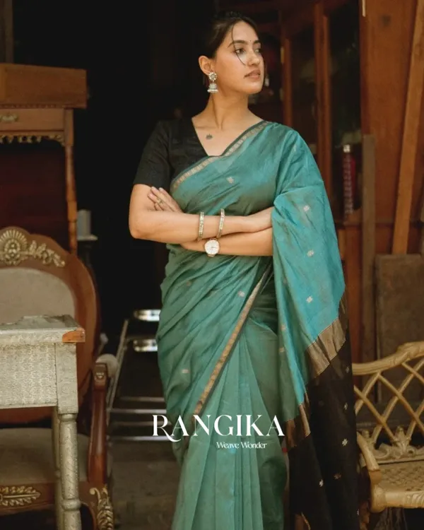 Bottle_Green_And_Black_Premium_Cotton_Silk_Saree_With_Classy_Blouse_and_tassels