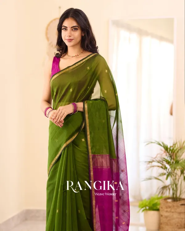 Green_Premium_Cotton_Silk_Saree_With_Classy_Blouse_and_tassels