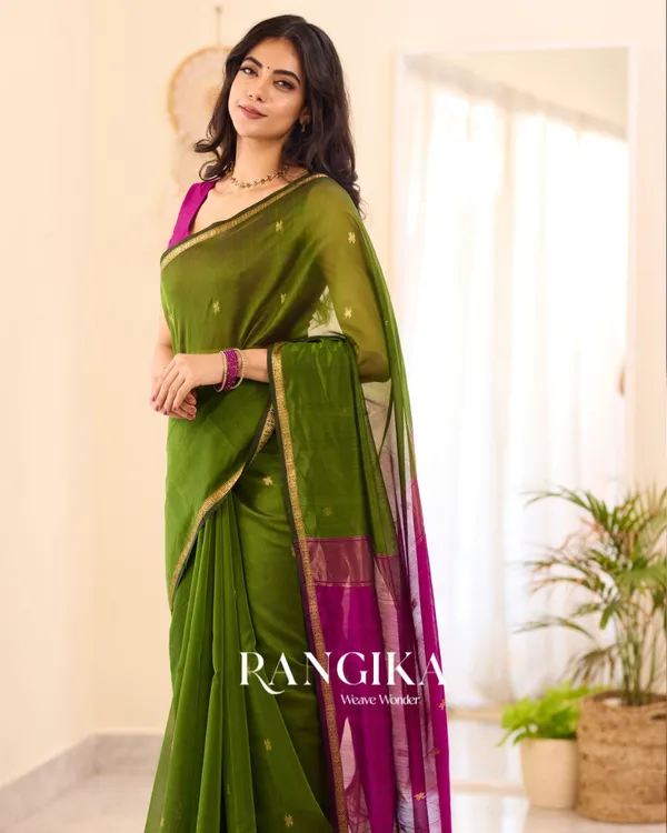 Green_Premium_Cotton_Silk_Saree_With_Classy_Blouse_and_tassels