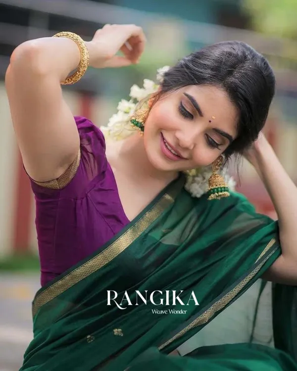 Green_Color_Premium_Cotton_Silk_Saree_With_Classy_Purple_Blouse_and_tassels