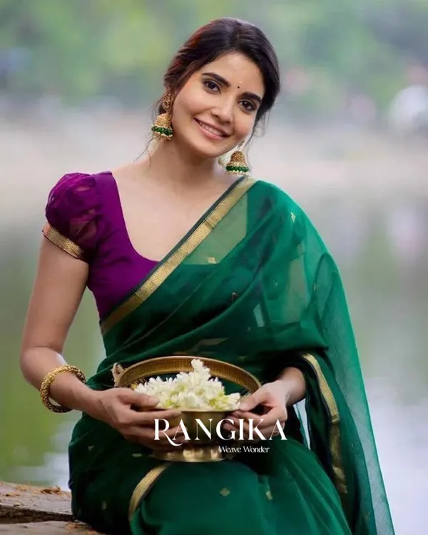 Green_Color_Premium_Cotton_Silk_Saree_With_Classy_Purple_Blouse_and_tassels