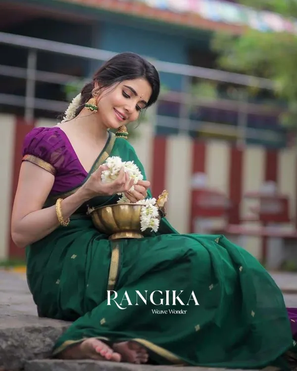 Green_Color_Premium_Cotton_Silk_Saree_With_Classy_Purple_Blouse_and_tassels