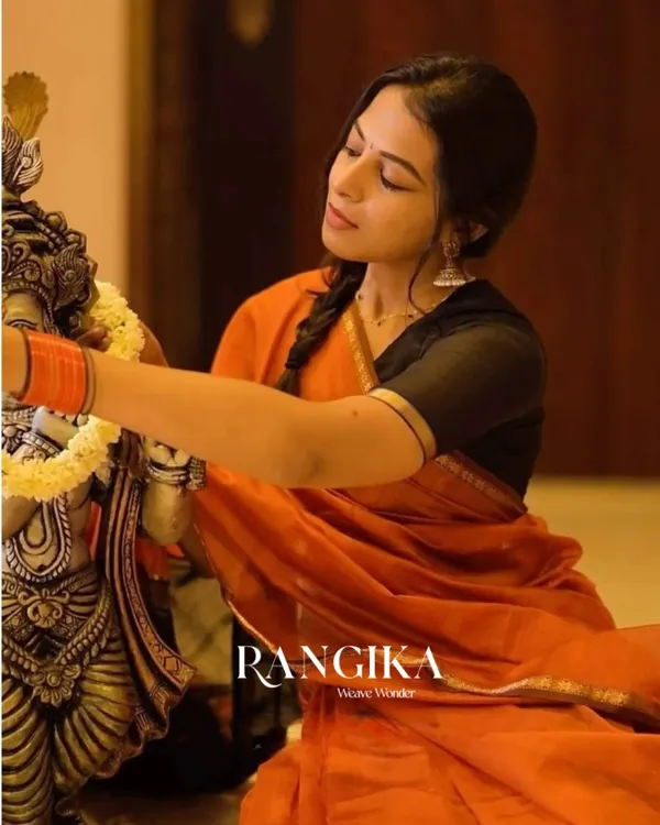 Orange_Premium_Cotton_Silk_Saree_With_Classy_Blouse_and_tassels