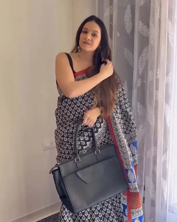 Classic_Contrast_-_White_&_Black_Linen_Saree_with_Black_Blouse