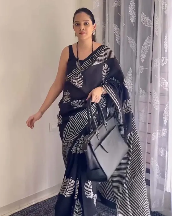 Shadow_Petals_-_Black_Linen_Saree_with_Black_Blouse_and_Floral_Accent