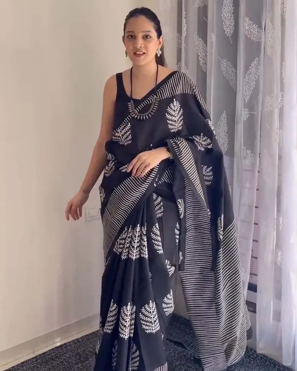 Shadow_Petals_-_Black_Linen_Saree_with_Black_Blouse_and_Floral_Accent
