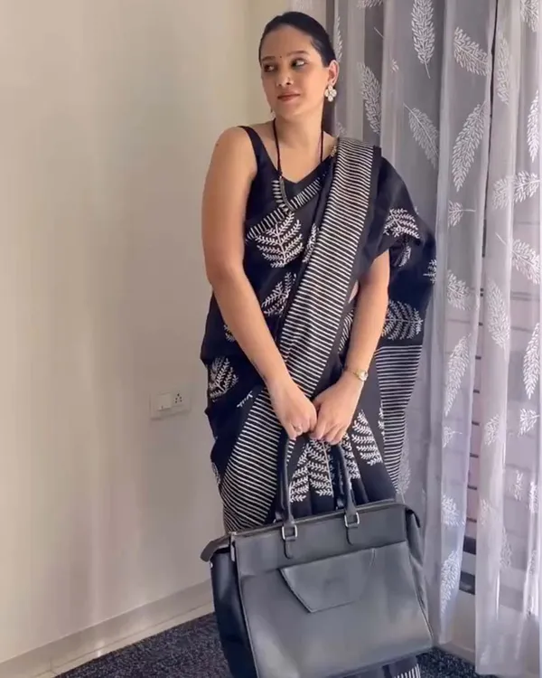 Shadow_Petals_-_Black_Linen_Saree_with_Black_Blouse_and_Floral_Accent