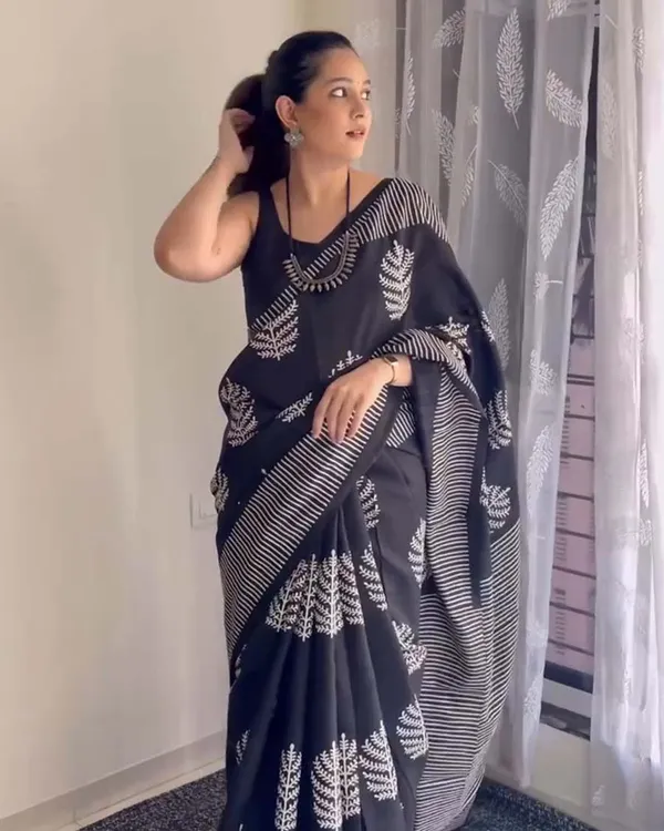 Shadow_Petals_-_Black_Linen_Saree_with_Black_Blouse_and_Floral_Accent